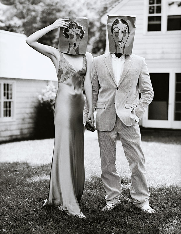  Karen Elson in Ralph Lauren Collection and male model in Marc Jacobs and Louis Vuitton. Hair, Didier Malige; makeup, Gucci Westman; set design, Mary Howard; New York, November 2003. Photograph by Arthur Elgort. From Grace: Thirty Years of Fashion at Vogue and Saving Grace: My Fashion Archive 1968-2016