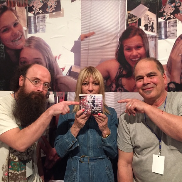 Kim Gordon, with Edward Lee and Byron Coley, co-owners of Feeding Tube records at the LA Art Book Fair. Gordon holds a copy of Living on the Edge of Obscurity. Photo by Ben Lee Richie Handler. Image courtesy of Gagosian
