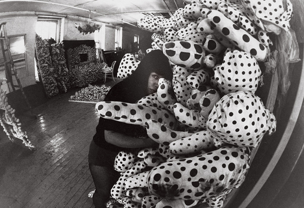 Yayoi Kusama with Accumulation pieces at her studio in New York (c.1963-64)
