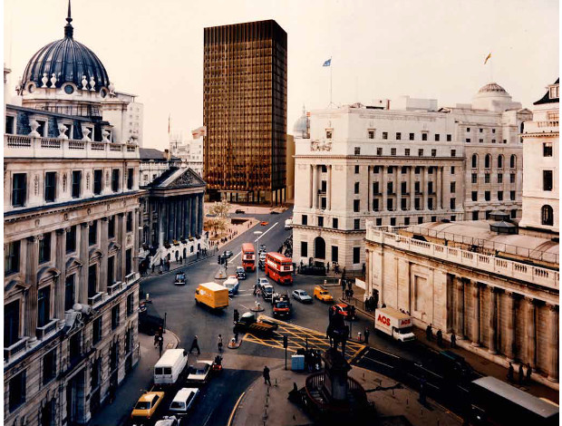 Mansion House Square; view of model collaged into photograph of site. As reproduced in Mies