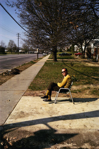Man On Sidewalk - William Eggleston